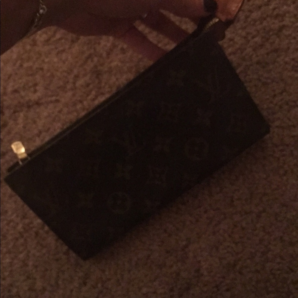 Authentic Louis Vuitton clutch/wristlet